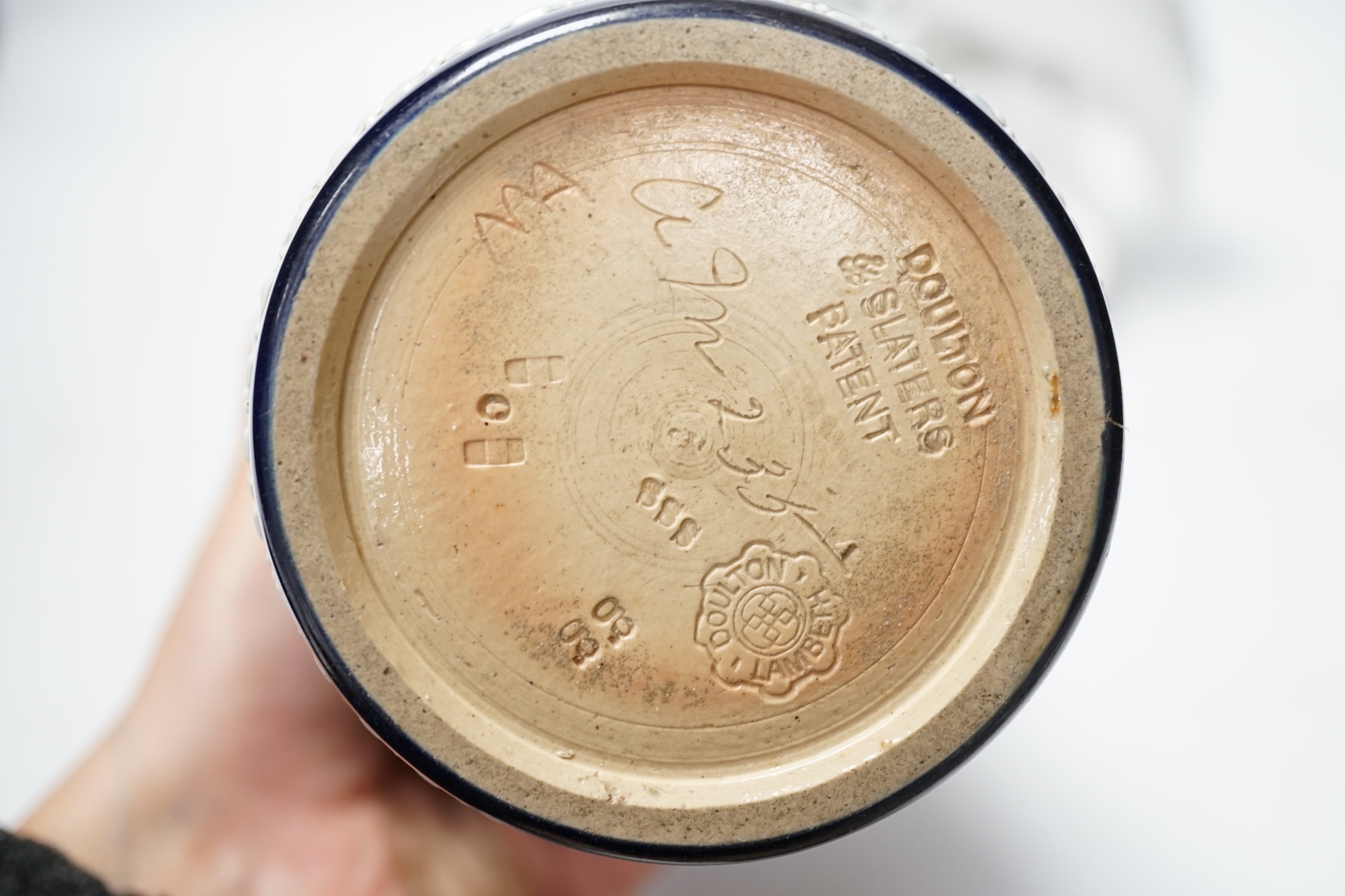 A Doulton and Slater’s patent stoneware vase and a Royal Staffordshire porcelain figure of a cockatoo, 33cm high. Condition - poor to fair condition, significant cracks to cockatoo